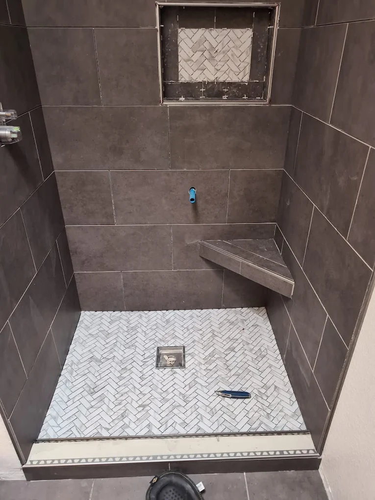 Custom tile shower installation in progress